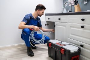 How do I clean my house after sewer backup
