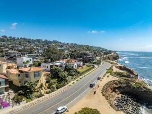 Why is coastal humidity a problem for Coronado homes